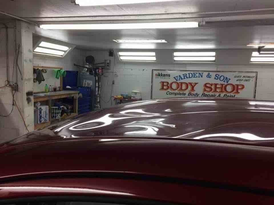 Paintless dent repair of dents across a car roof — before