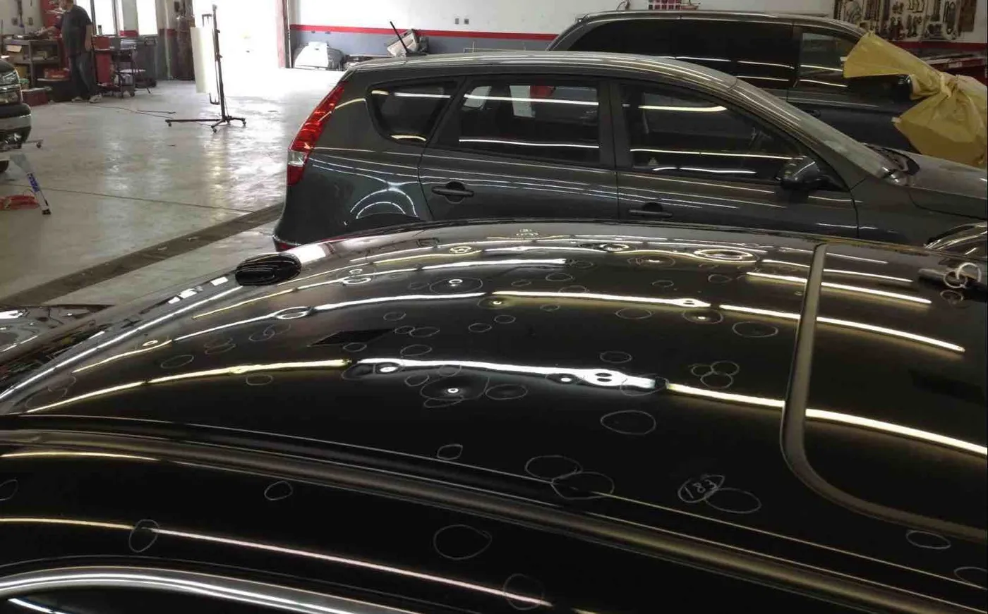 Hail damage on a car roof